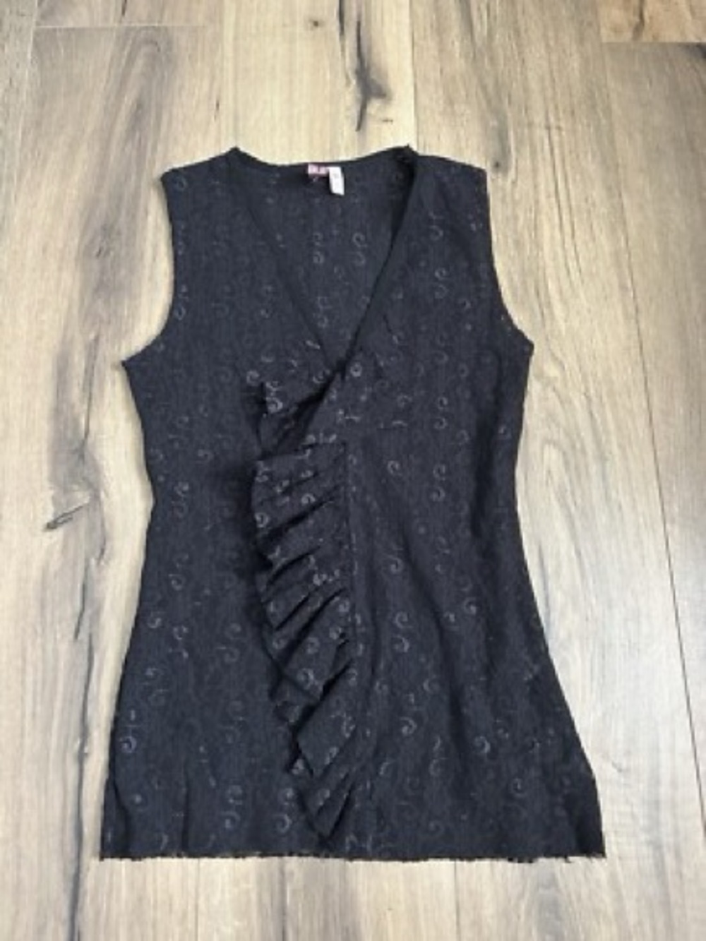 Sweet Pea Black Sleeveless Ruffle Front Top